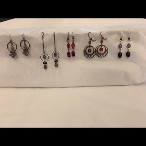 5 Beautiful pairs of dangle earrings.
